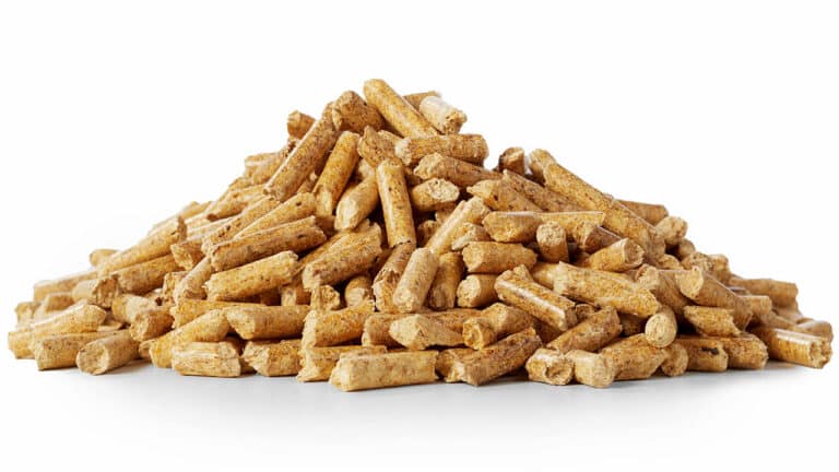 a pile of animal feed pellets on a white background